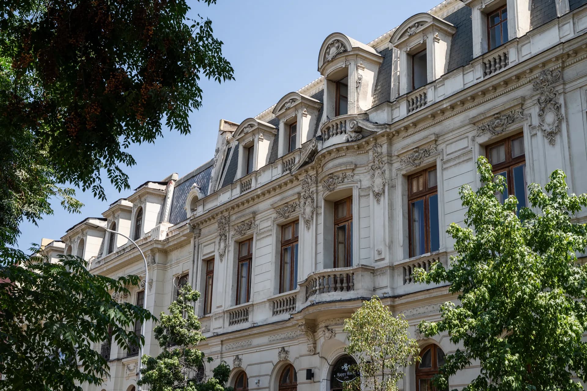 Happy House — boutique hotel in a French neoclassical heritage mansion in downtown Santiago de Chile with garden patio and pool